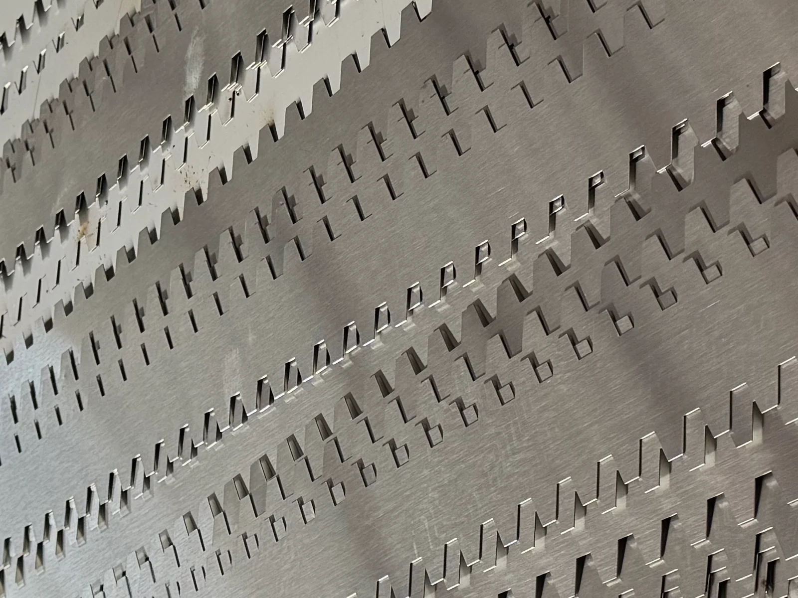 Laser-fabricated stainless steel parts