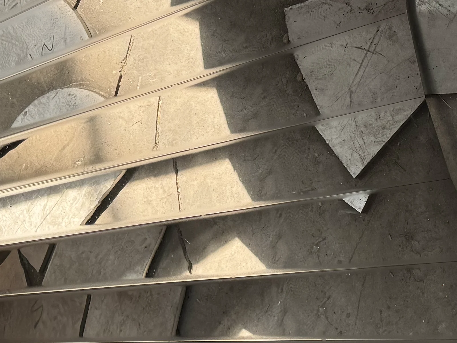 Precision laser-cut stainless steel parts for industrial equipment