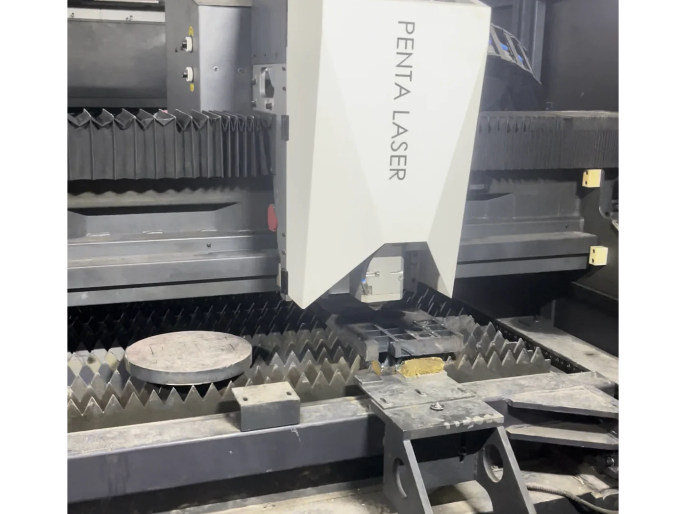 Fiber laser cutting with precision sparks on metal surface